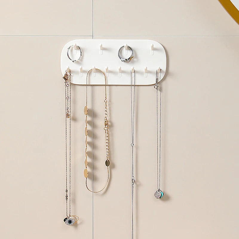 porte bijoux mural blanc moderne adhésif 12 crochets rangement plat lisse