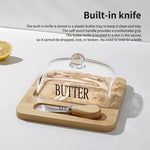 Beurrier en bois brun avec couvercle en verre transparent