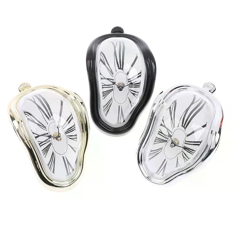 horloges murales surréalistes dali or noir argent chiffres romains aiguilles forme organique transparentes salon