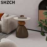 table basse ronde pierre moderne minimaliste sculptural couleur vive salon