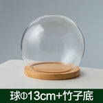 boule verre transparent socle bois décoration d'intérieur moderne objet d'exposition moderne