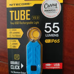 lampe torche rechargeable compacte moderne bleu noir orange logo nitecore anneau métallique certifiée ccc