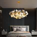 Suspension lumineuse contemporaine dorée fleurs stylisées salon chambre d'hôtel led sources lumière