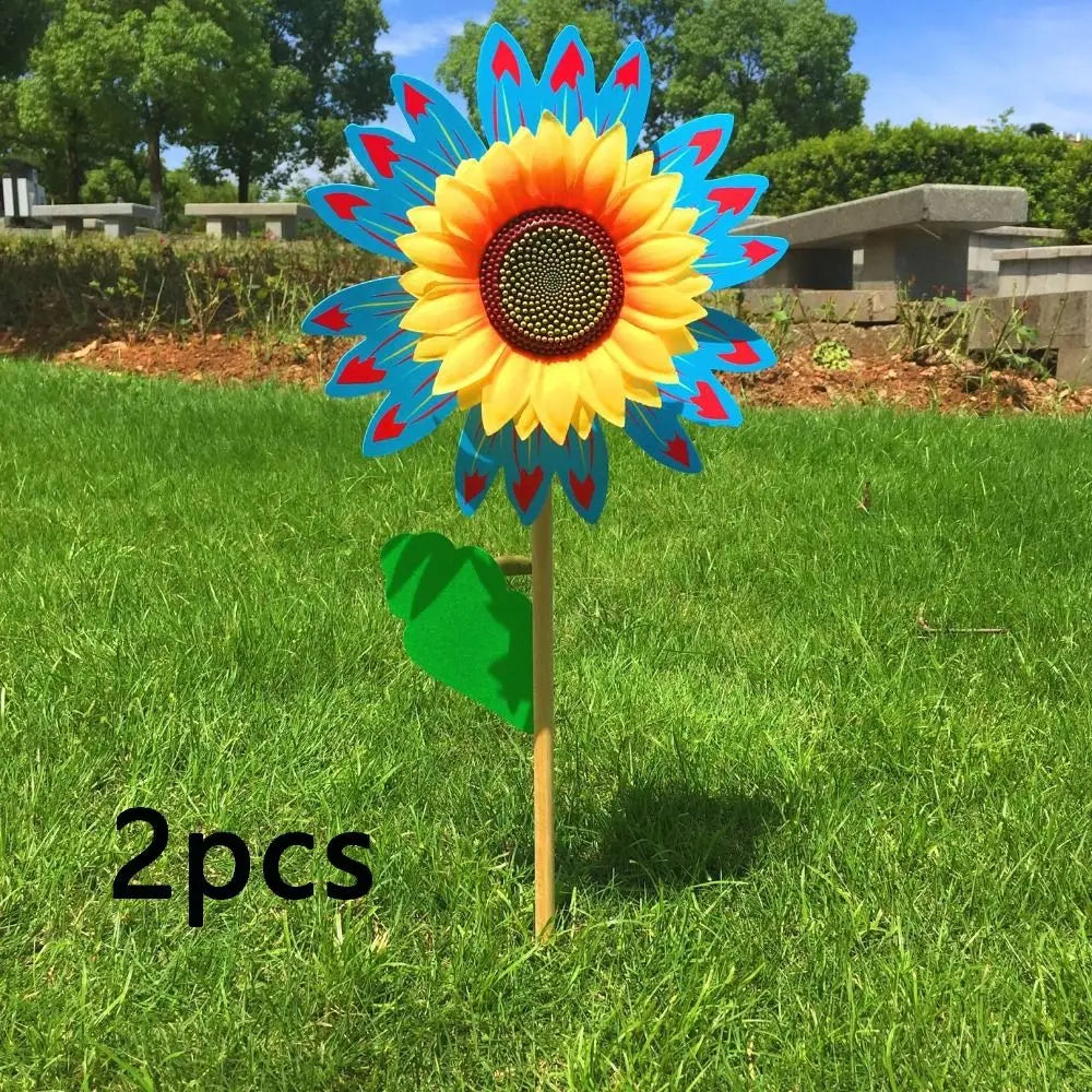 décoration extérieure fleur artificielle jaune rouge bleu vert rayonnante pétale verte tringle jardin cour