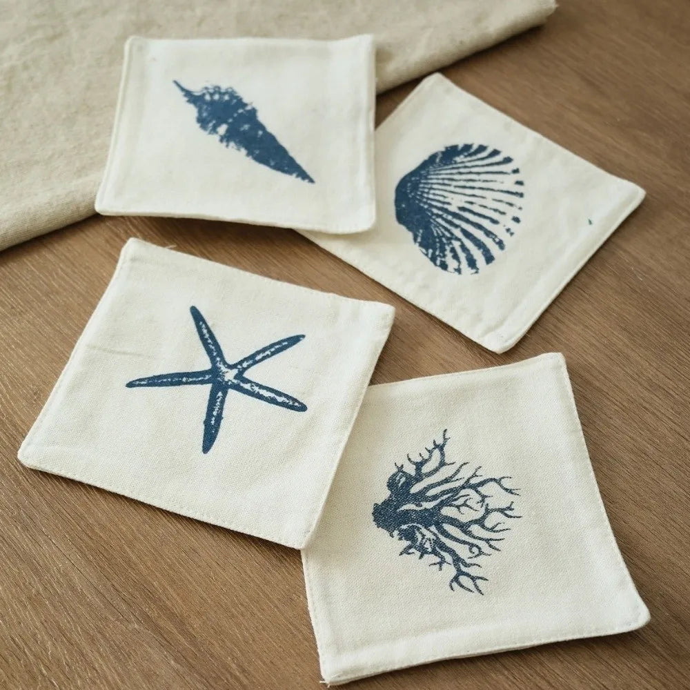 serviettes table classiques marin imprimées coquillages étoiles mer plumes géométriques blanc bleu marine