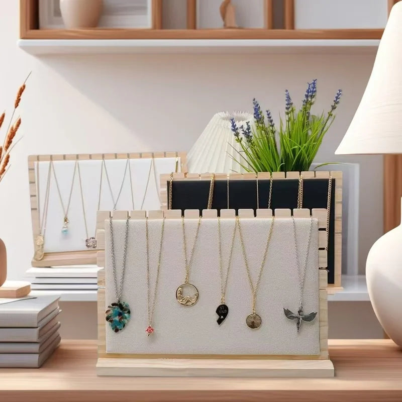 colliers exposants bois velours or argent bleu rose clips modernes minimalistes