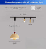 suspension lumineuse moderne vert beige rouge brillante câble suspendu minimaliste