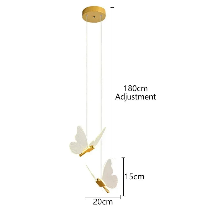 suspension lumineuse moderne or papillons effet lumineux diffus trois têtes