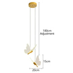suspension lumineuse moderne or papillons effet lumineux diffus trois têtes