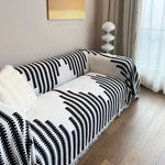 serviette canapé chenille jacquard motif feuilles noires blanc moderne opacité franges élégantes machine lavable