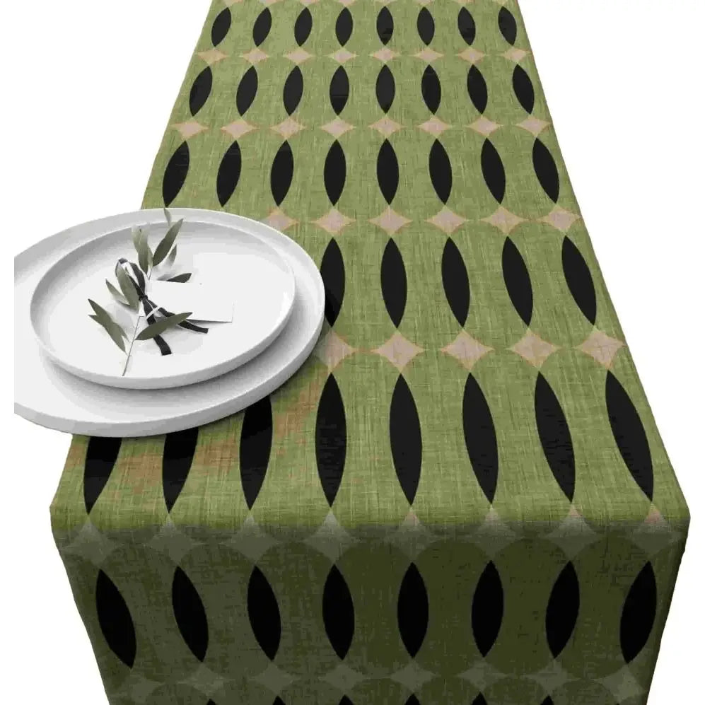 nappe lin géométrique moderne vert olive noir beige assiettes blanches branches feuilles restaurant cuisine