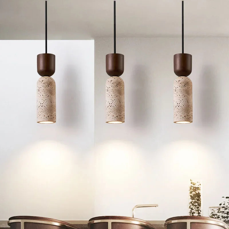 Lampes suspendues moderne minimaliste pierre texture granuleuse lumière chaude chambre salon restaurant étude