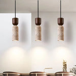 Lampes suspendues moderne minimaliste pierre texture granuleuse lumière chaude chambre salon restaurant étude
