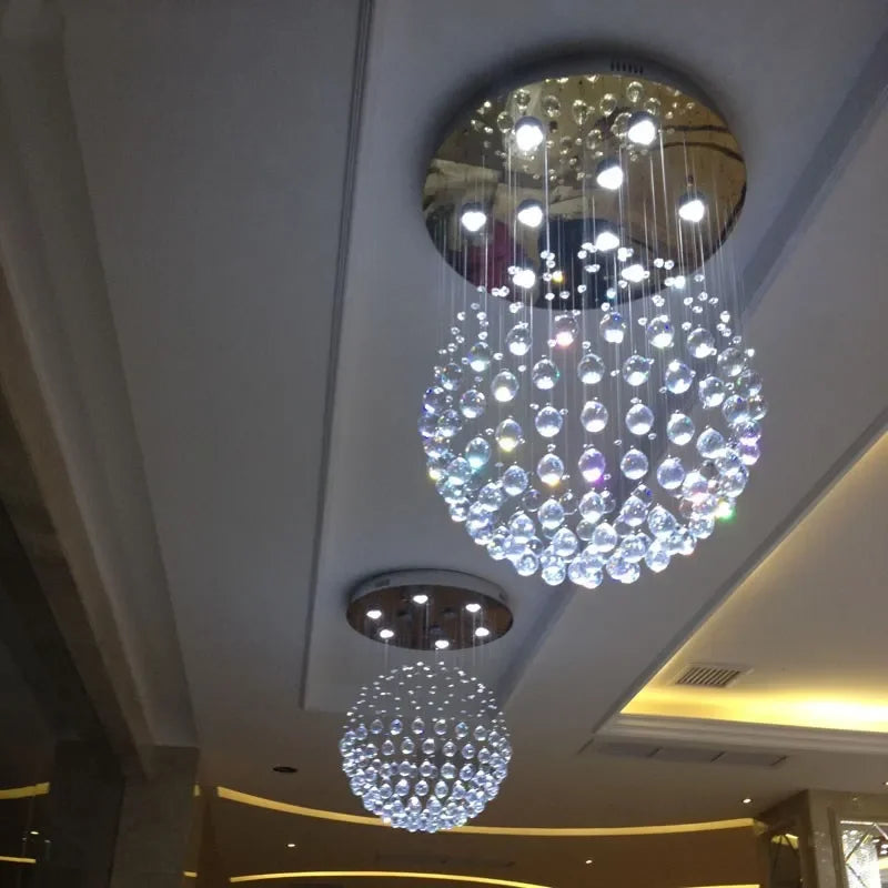 suspension lumineuse moderne cristal dorées élégante lumière led transparente fixations invisibles chambre salon