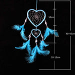 décoration murale attrape rêves plumes coquillages boho chic coeurs bleu rose violet