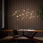 suspension lumineuse moderne spirales lumière blanc doré chambre salon