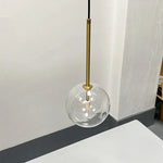suspension lumineuse moderne transparente dorée brillante scandinave câble électrique fixée