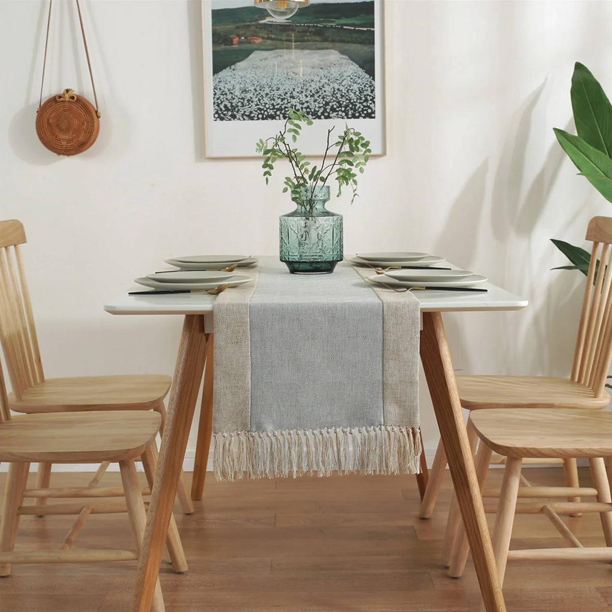 nappe tissée franges scandinave minimaliste gris beige vertebranches verte plante verte pot artwork encadré