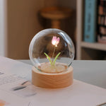 veilleuse nuit tulipes rose pâle feuilles vertes base bois transparent moderne