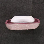 support savon moderne bleu jaune velcro drainage plateau rangement rose gris texture granulée