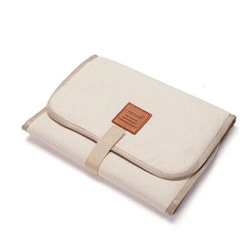 coussin bain pliable moderne pratique beige clair toile simple ruban adhésif
