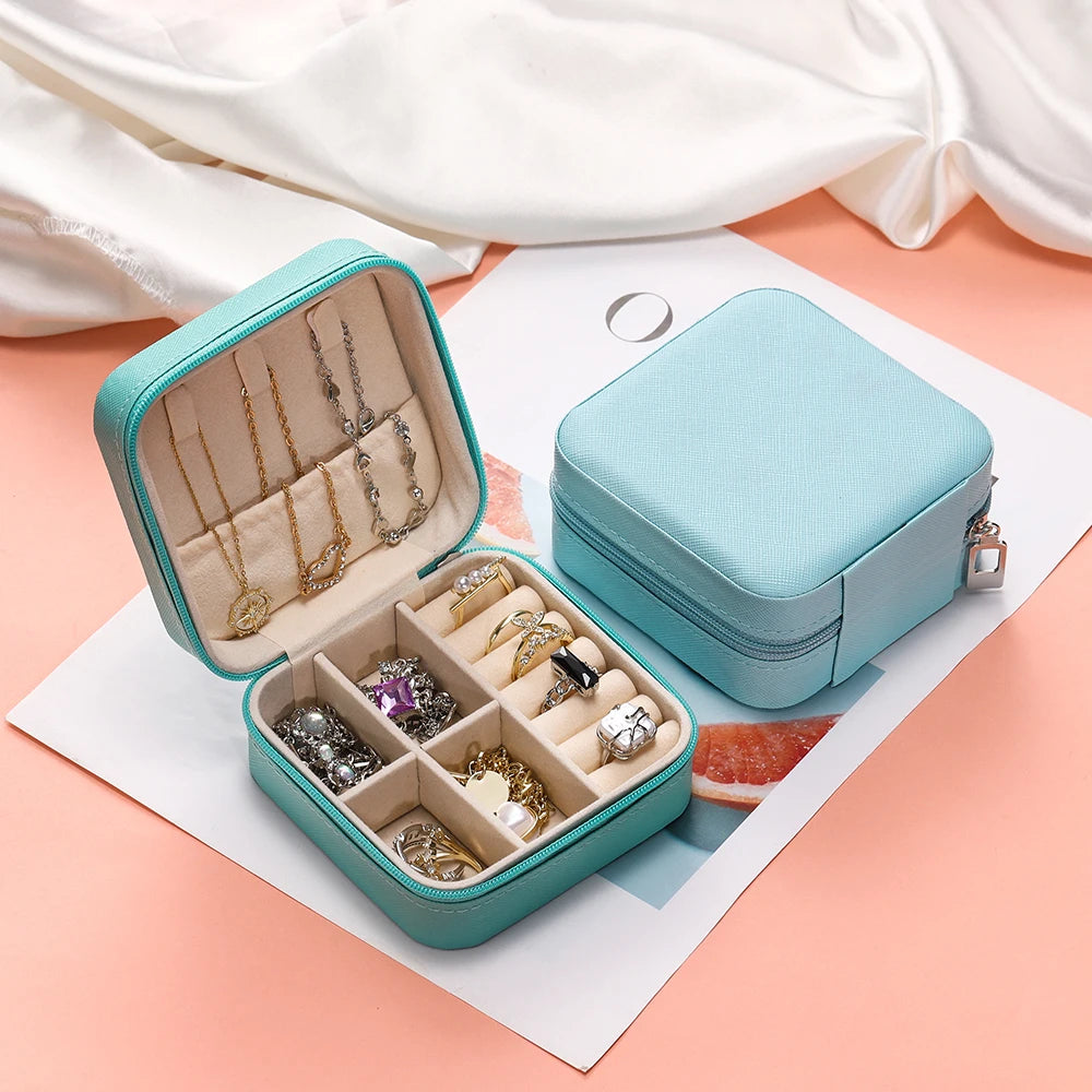 boîte bijoux simili cuir moderne compartiments noir vert rose clair orange fermeture éclair portable
