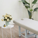 table massage adulte gris clair moderne couverture tabouret pieds