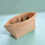 sac cosmétique moderne réutilisable beige noir rose pâle uni opaque poignée amovible compartiments intérieurs