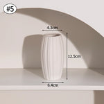 vase céramique blanc moderne rayures verticales fleurs artificielles décoration salon