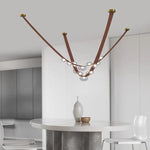 Suspension lumineuse contemporaine boules translucides structure métallique noir marron doré minimaliste