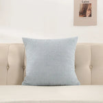 coussin peluche vert jaune rose gris clair texture bouclée moderne 60x60cm fixations