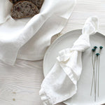 serviettes lin naturel beige clair orange blanc gris rose pâle tissu doux classique rustique