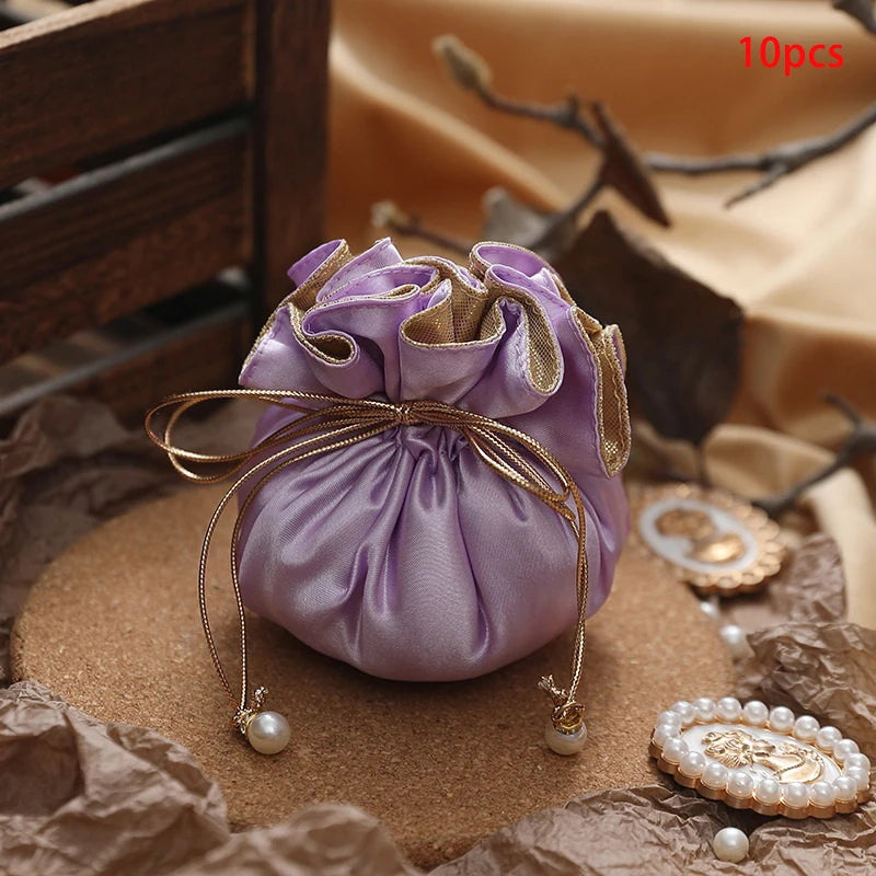 sac cadeau violet satiné ruban doré blanche élégant anniversaire bijoux cadeau opulent 10 pièces