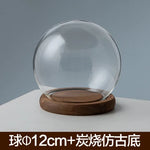 boule verre transparent socle bois décoration d'intérieur moderne objet d'exposition moderne