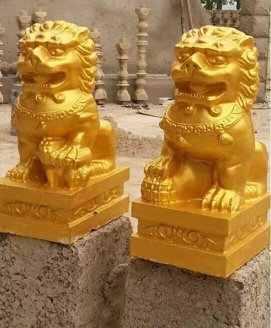 statues lions chinois or blanc crème sculptées détaillées traditionnel asiatique résistant extérieur