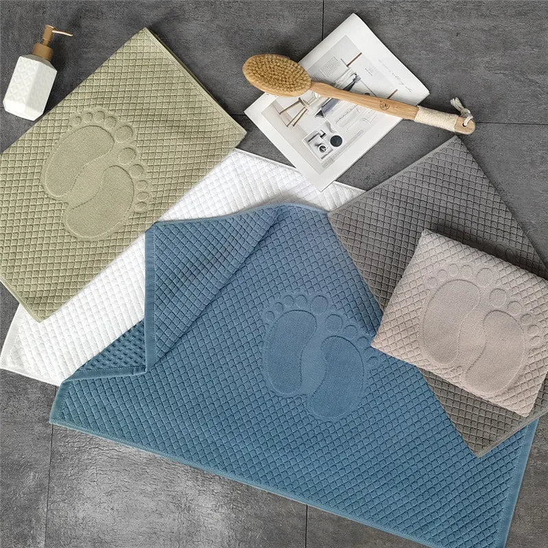 tapis bain coton absorbant motif pieds moderne vert clair gris bleu clair