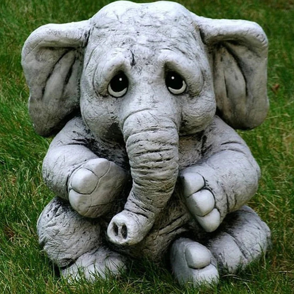 statue éléphant gris blanc décoratif jardin animalier texturé extérieur triste expressioniauxenfantin herbe vigne