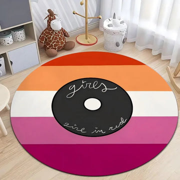 tapis rond moderne motif géométrique couleurs vives décoration salon chambre enfant intérieur graphique