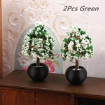 décoration intérieure plante artificielle fleurs feuilles pot terre cuite galets blancs moderne minimaliste