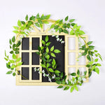 guirlande végétale naturelle fleurs vertes violettes blanches roses extérieur décoration maison jardin mariage festivités