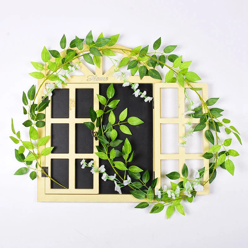 guirlande végétale naturelle fleurs vertes violettes blanches roses extérieur décoration maison jardin mariage festivités