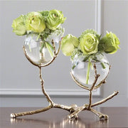 Vase en verre avec branches dorées et support laiton transparent pour décoration florale moderne