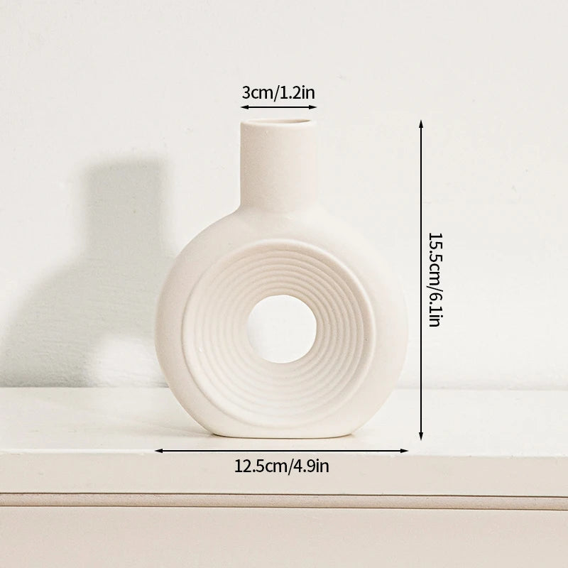 vases blancs modernes céramique rondes lignes horizontales décoration intérieure simple