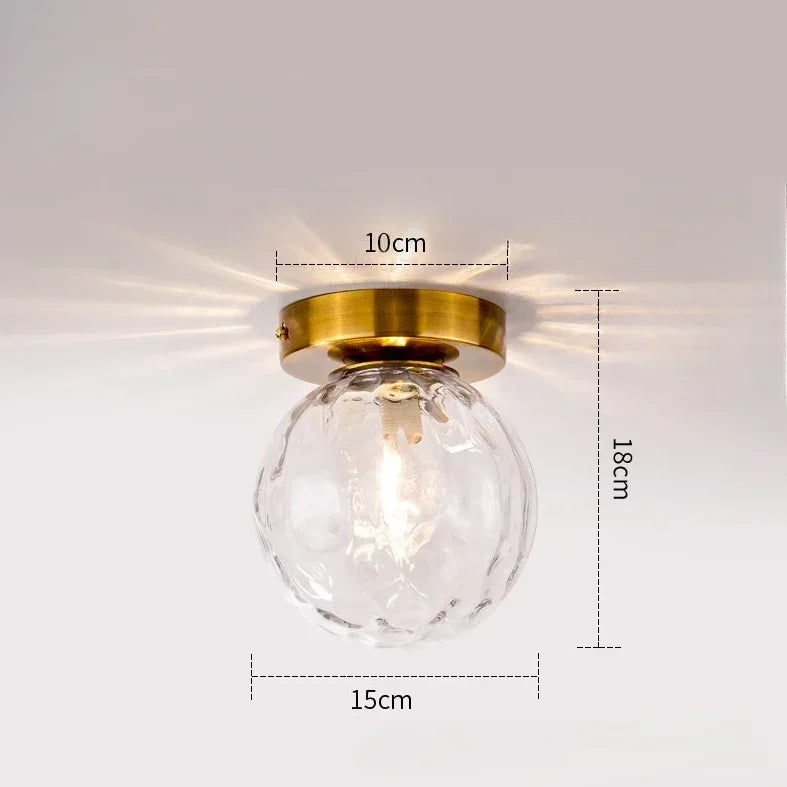 lampe moderne verre transparent noir doré élégante sphérique éclairage contemporain