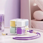 cube rangement médicaments violet blanc vert jaune moderne compartiments cordelette portable organisation