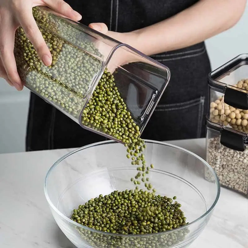 boîtes rangement alimentaire transparentes poignées noires multiple tailles réutilisables modernes pratiques épices pâtes graines
