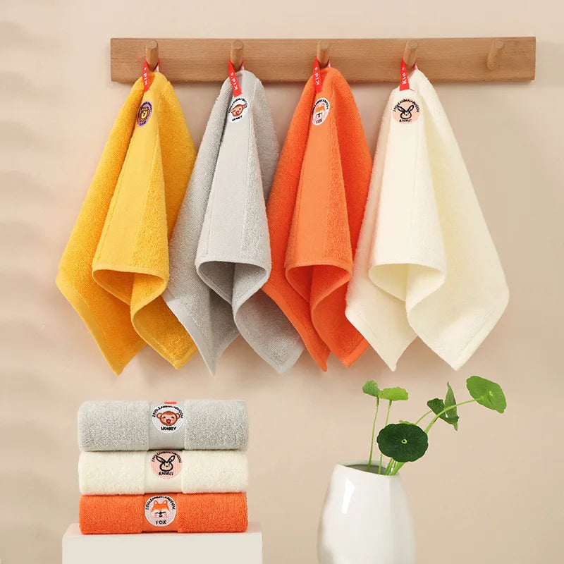 serviette coton animaux brodés jaune gris enfant rapide absorbante face toilettage