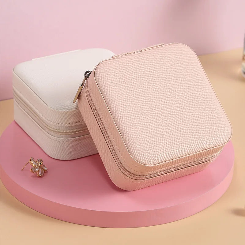 boîte rangement bijoux simili cuir vert clair rose pâle noir moderne pratique fermeture glissière
