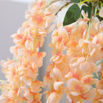 guirlande artificielle fleurs rouge orange bleu rose moderne extérieur accrochée decoration maison jardin mariage