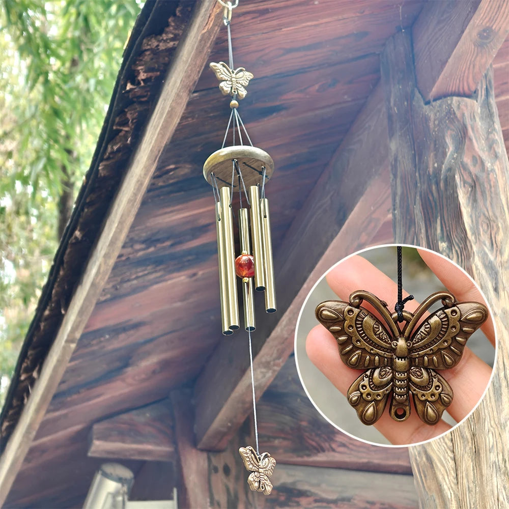 cloches vent clochette artisanale bronze papillons poissons suspendus décor intérieurextérieur ornement métallique plateau bois